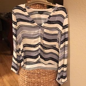 Blouse. Light blue and black stripes.